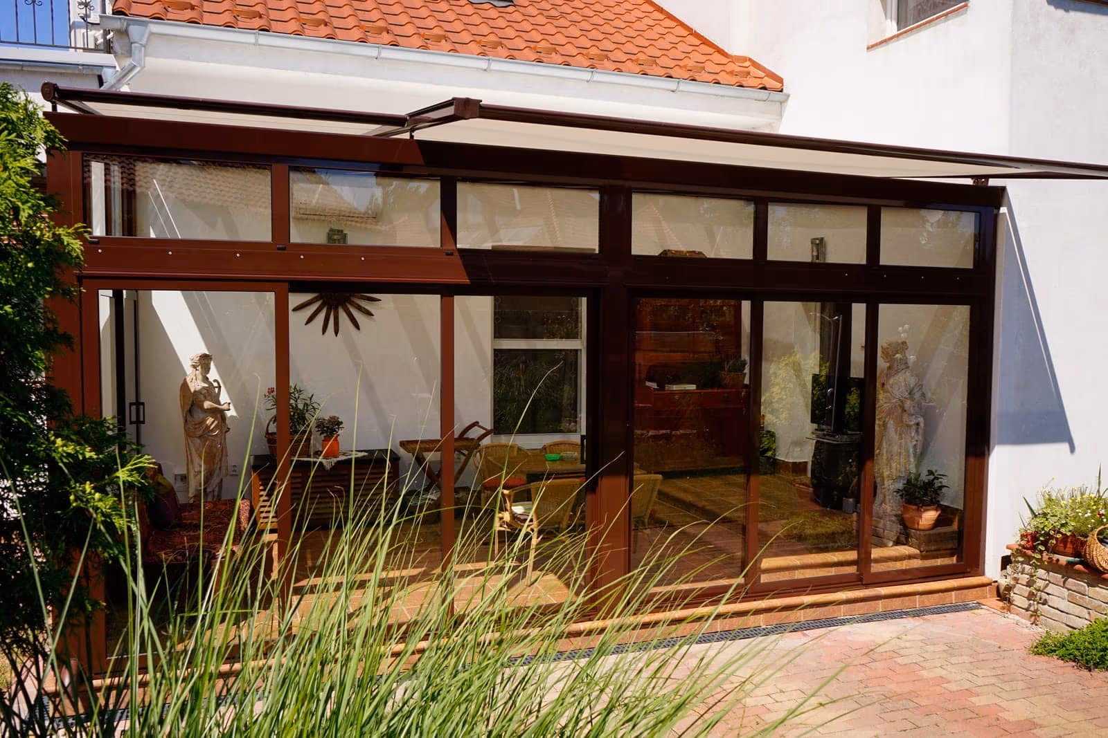 Top Garden 2 télikert, amely egy alumínium pergola beüvegezésével jött létre